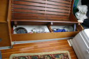 Storage under starboard settee